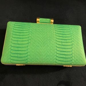 Aldo clutch in teal with gold hardware